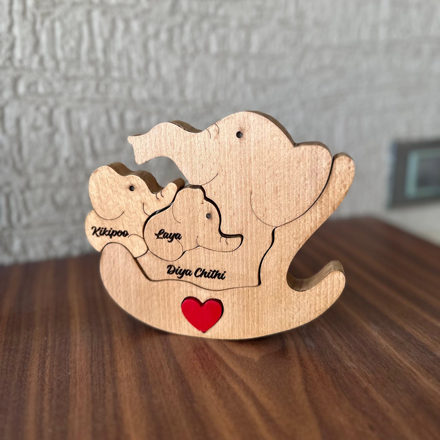 wooden engraving elephant mom and 2 babies