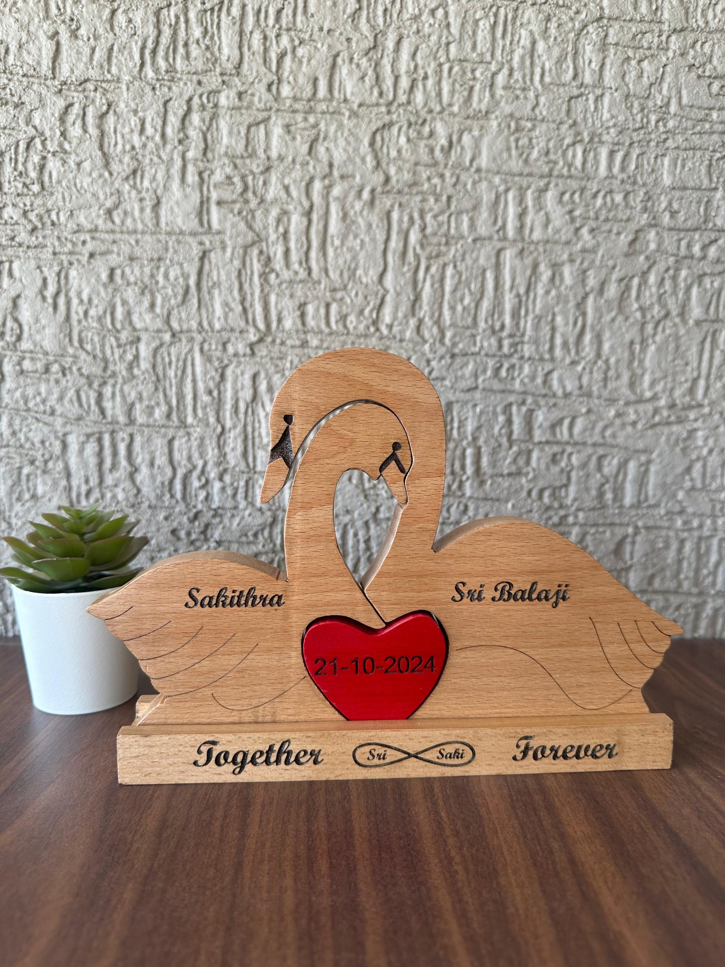 Wooden engraving swan family of 2