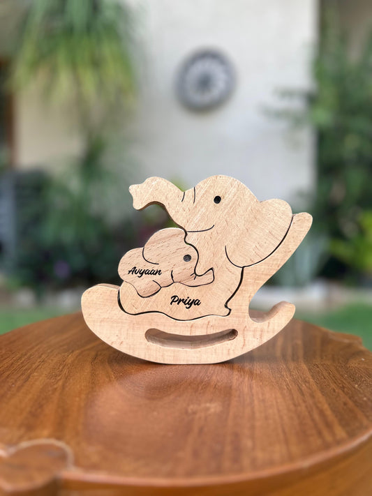 Wooden engraving elephant mom and baby