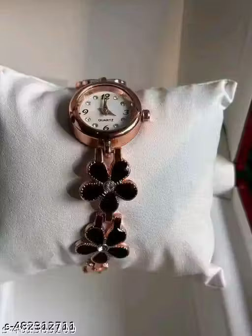 FLOWER PATTERN SRTAP WATCHES FOR WOMEN .